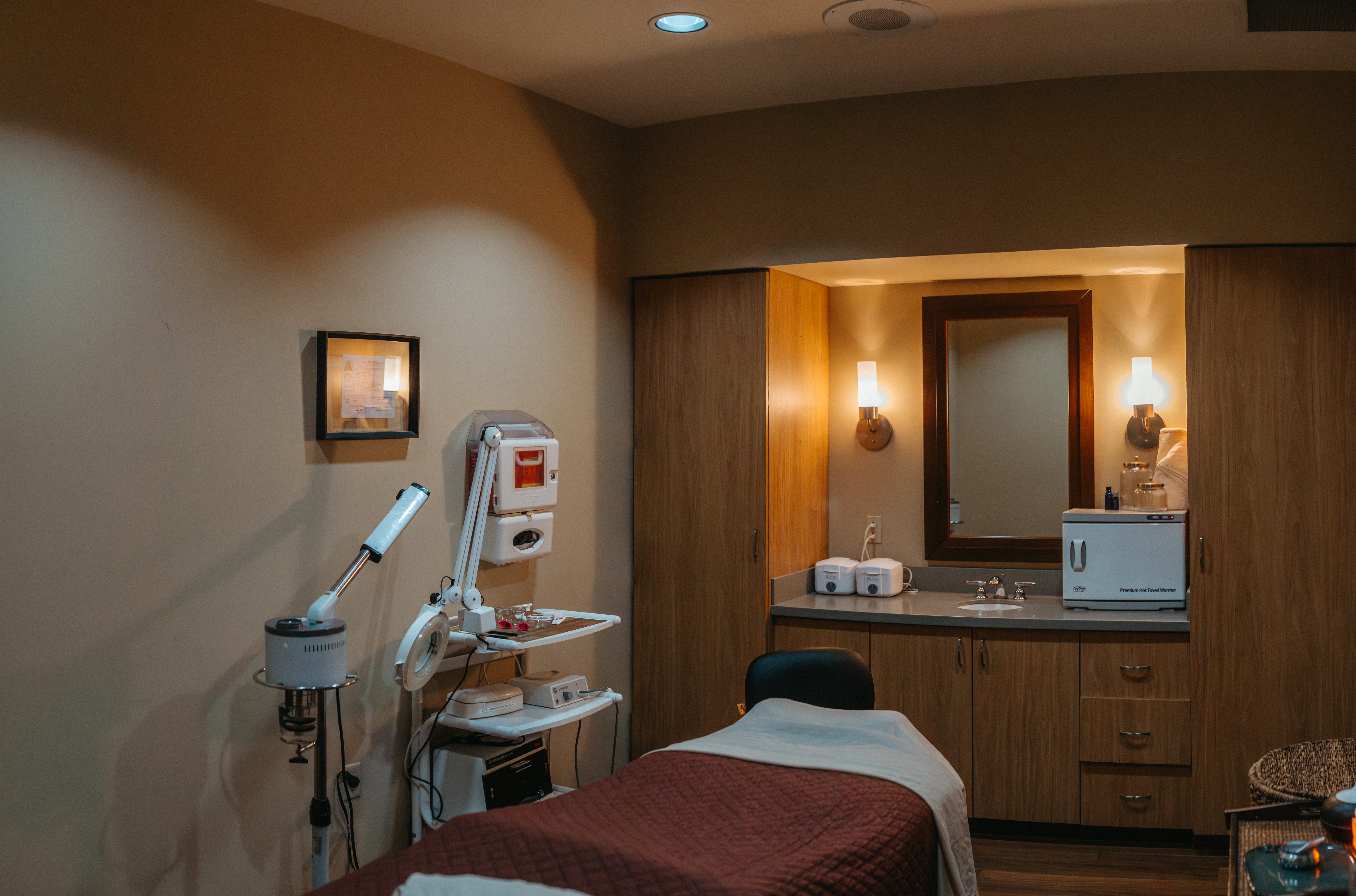 Clean, professional medical spa treatment room with neutral tones at UAB Medicine St. Vincent’s One Nineteen Spa in Birmingham