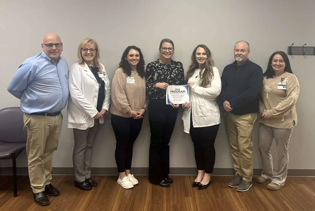 Pictured left to right: Regional Director JD Frantini; Director of Outpatient Services Alethea Light; OPC Samantha Box; Program Nurse Stacy James; Therapists Jennifer Thomason and Clint Reeve; and OPC/Community Liaison Crystal Olberding